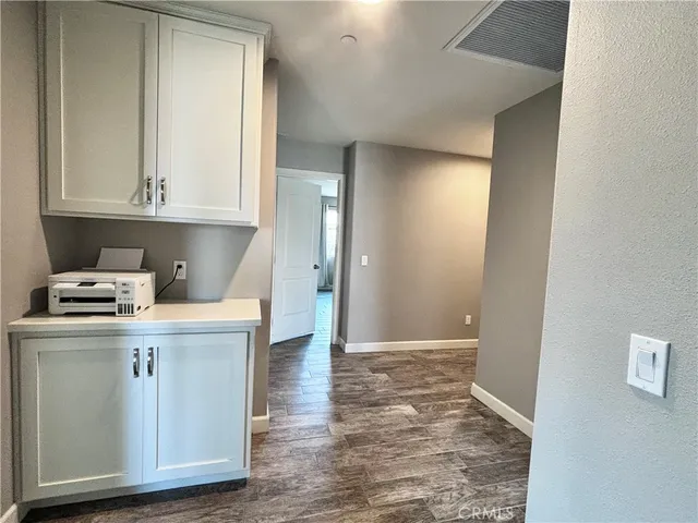 a kitchen with a stove and a refrigerator