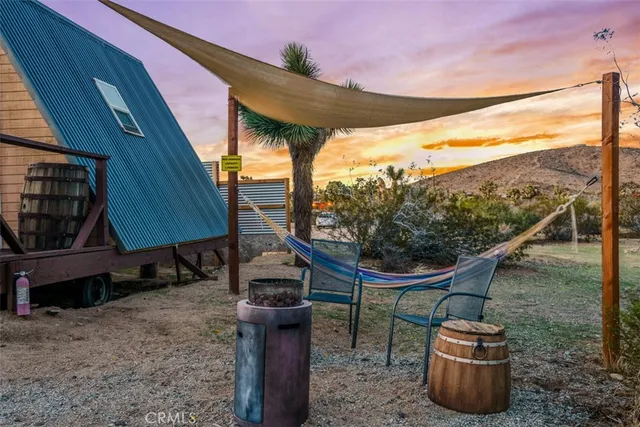 a view of a swimming pool with a patio