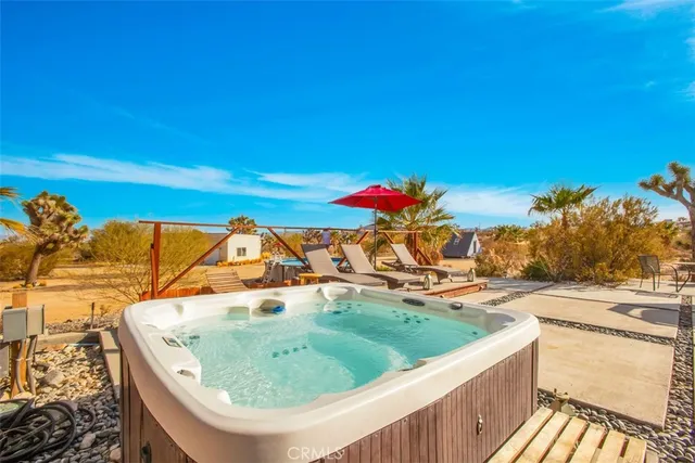 a bedroom with bed and a window