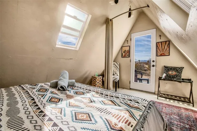 a view of a chairs and table in a patio