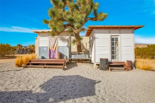 a view of a city with lush green forest