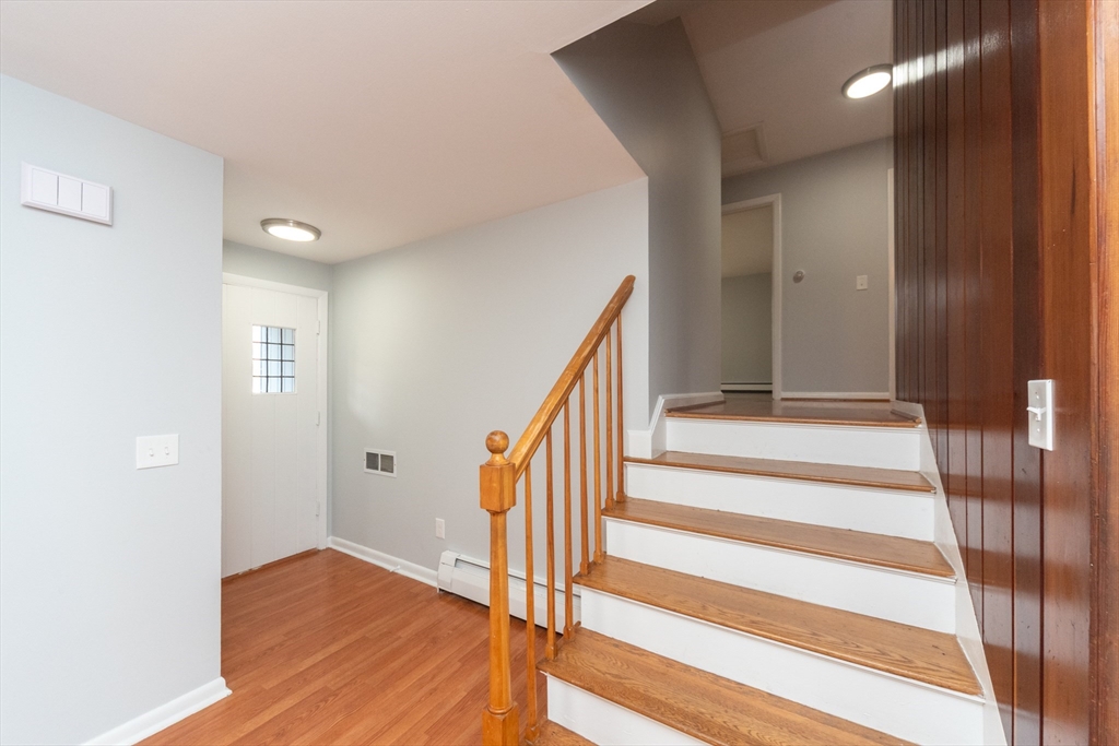 164 Sterling Road Lancaster, MA 01523 - Photo 14 of 36 a view of entryway with wooden floor