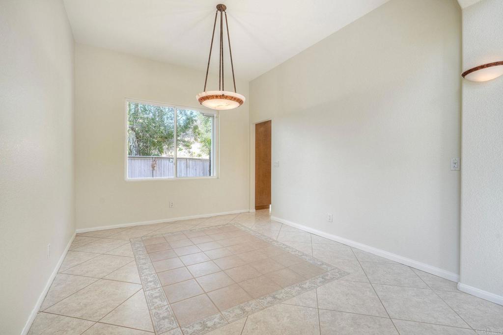 2914 Rancho Rio Chico Carlsbad, CA 92009 - Photo 10 of 37 a view of a room with a chandelier