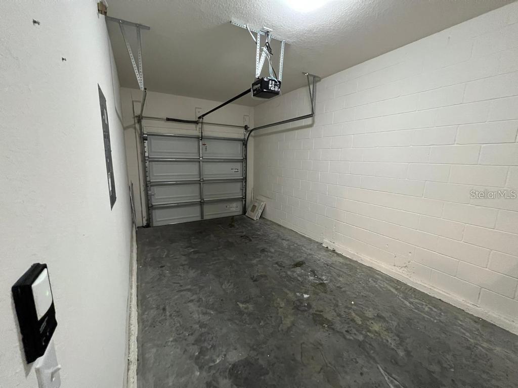 8301 Pine River Road Tampa, FL 33637 - Photo 11 of 16 a view of a room with racks on the wall