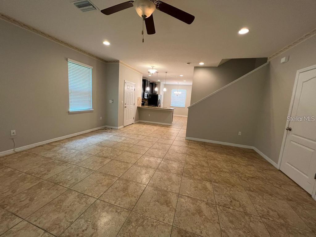 8301 Pine River Road Tampa, FL 33637 - Photo 13 of 16 a view of a livingroom and a staircase