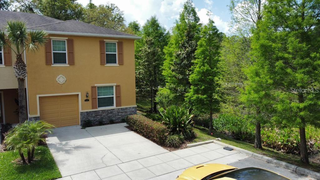 8301 Pine River Road Tampa, FL 33637 - Photo 15 of 16 a view of entryway of house with yard