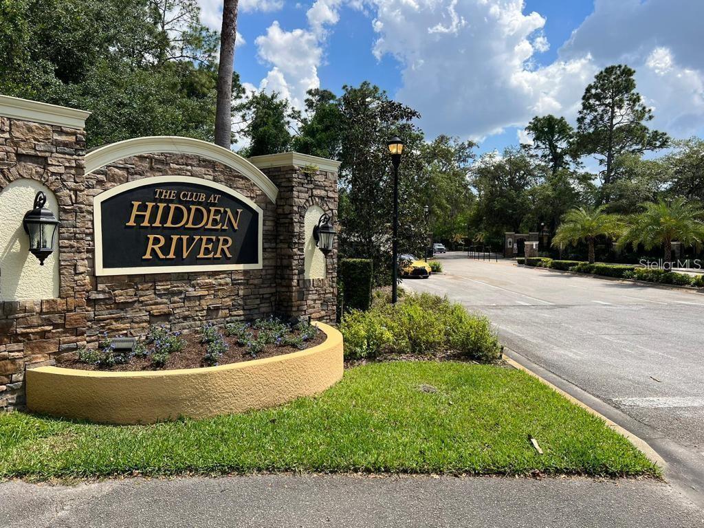 8301 Pine River Road Tampa, FL 33637 - Photo 3 of 16 a view of a street with sign board