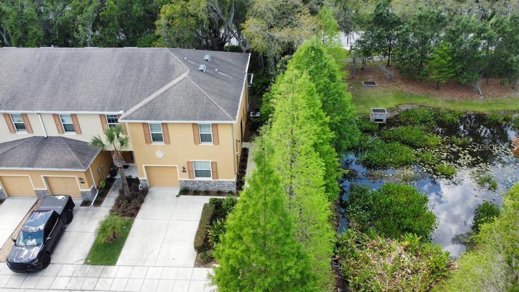 8301 Pine River Road Tampa, FL 33637 - Photo 4 of 16 an aerial view of a house with a yard garden and patio