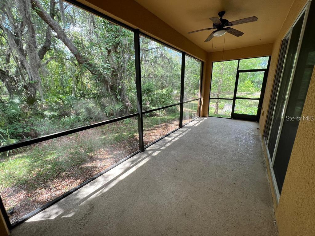 8301 Pine River Road Tampa, FL 33637 - Photo 7 of 16 a view of a room with a floor to ceiling window