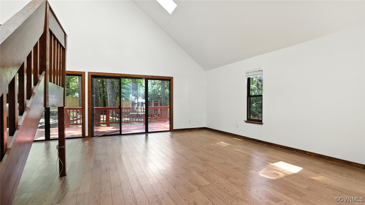636 Spirea Road North Chesterfield, VA 23236 - Photo 16 of 47 Unfurnished room with high vaulted ceiling, wood f