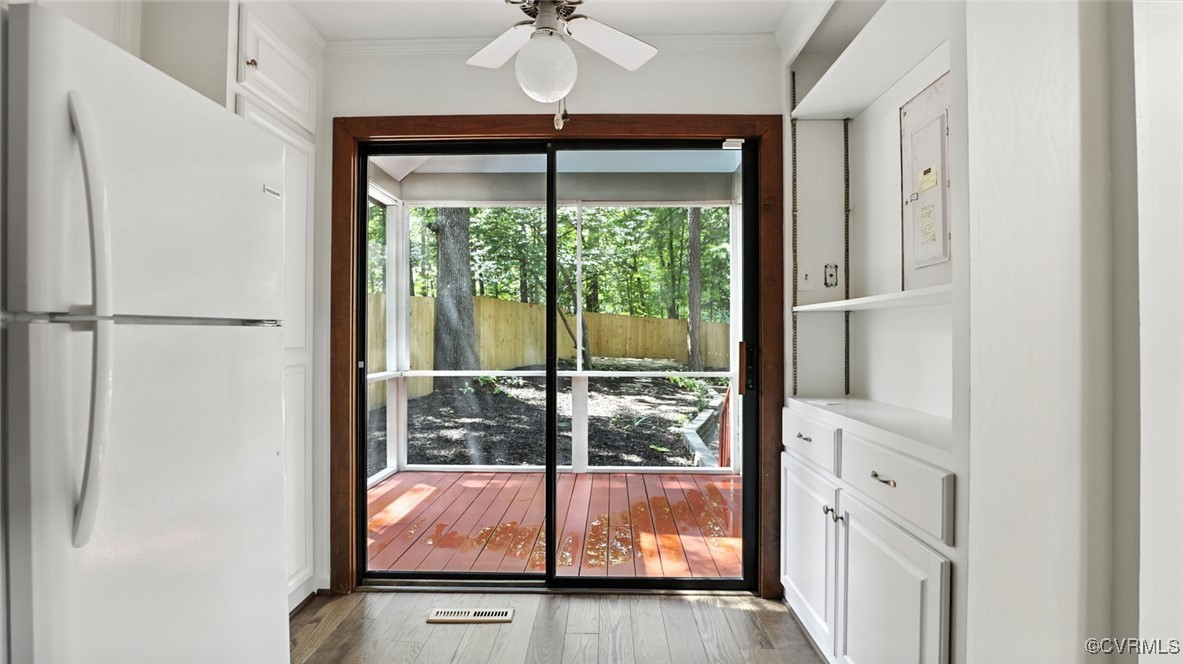 636 Spirea Road North Chesterfield, VA 23236 - Photo 20 of 47 Doorway featuring wood-type flooring, crown moldin