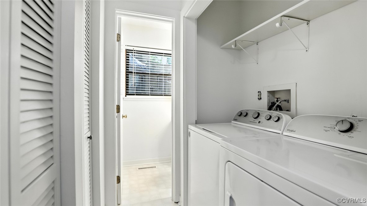 636 Spirea Road North Chesterfield, VA 23236 - Photo 33 of 47 Laundry area featuring washing machine and clothes