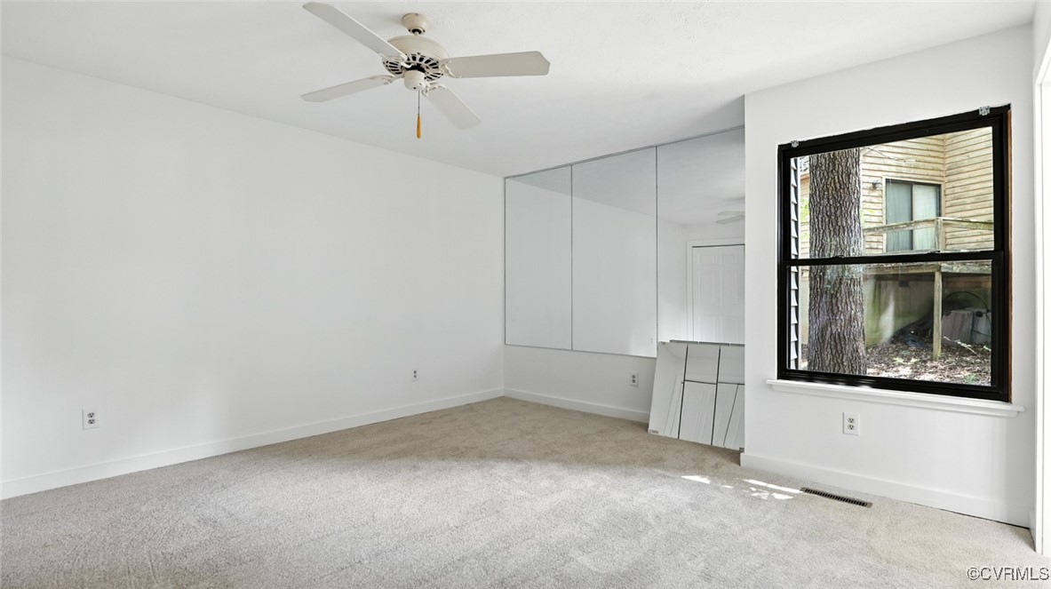636 Spirea Road North Chesterfield, VA 23236 - Photo 34 of 47 Empty room featuring carpet and ceiling fan