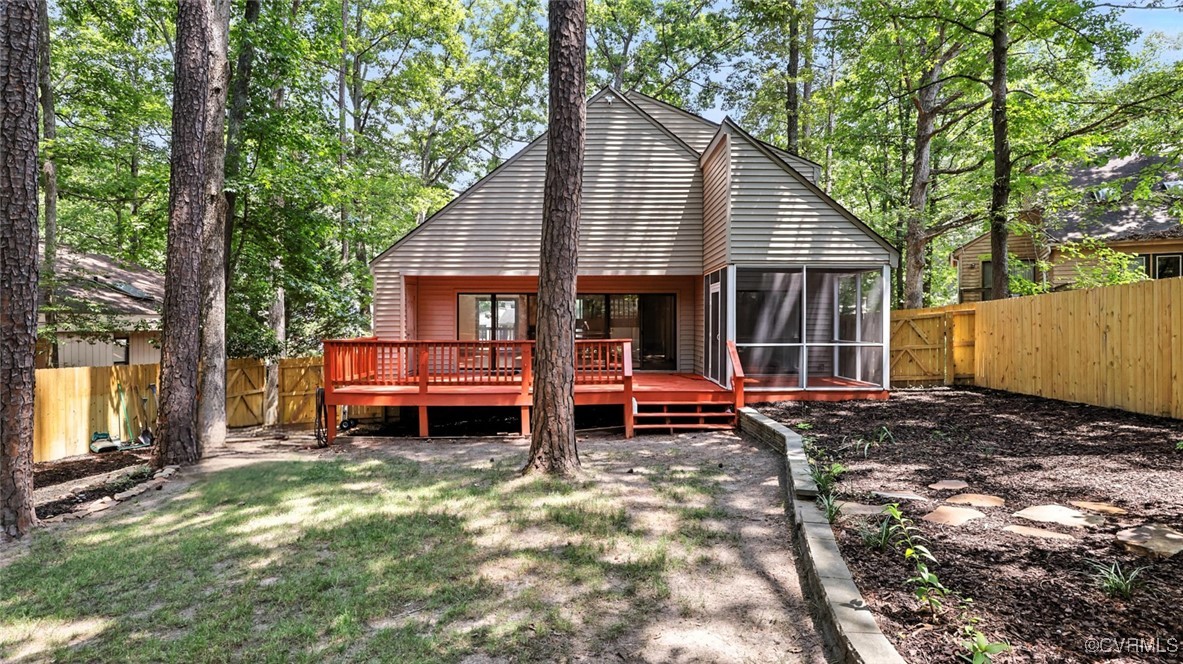 636 Spirea Road North Chesterfield, VA 23236 - Photo 37 of 47 Back of property with a fenced backyard, a sunroom