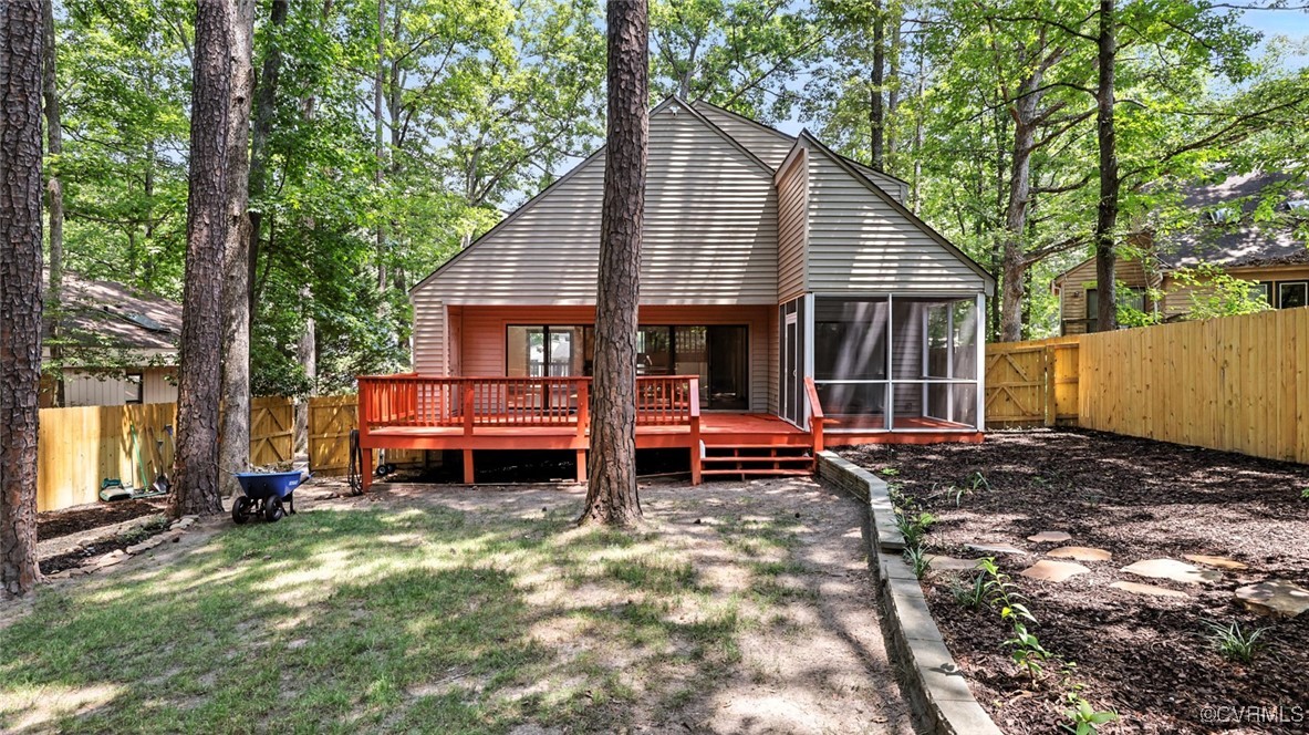 636 Spirea Road North Chesterfield, VA 23236 - Photo 40 of 47 Back of house with a fenced backyard, a sunroom, a