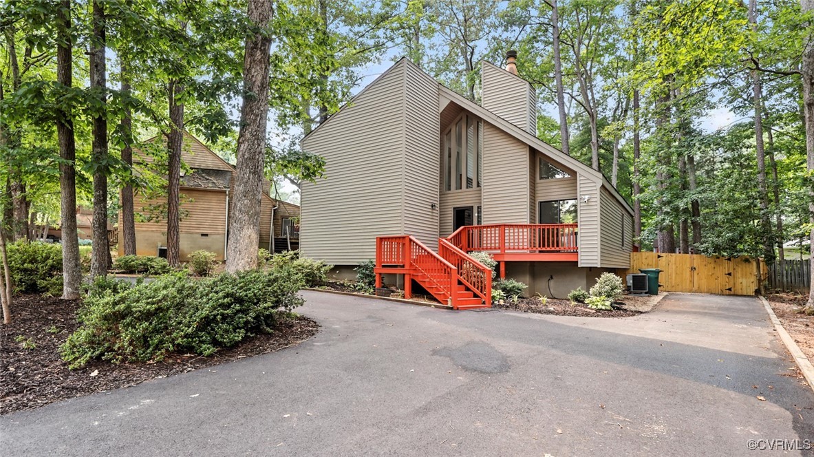 636 Spirea Road North Chesterfield, VA 23236 - Photo 4 of 47 View of front facade featuring a gate, a chimney,