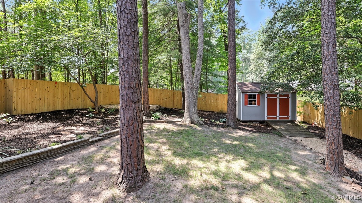 636 Spirea Road North Chesterfield, VA 23236 - Photo 44 of 47 Fenced backyard with a shed