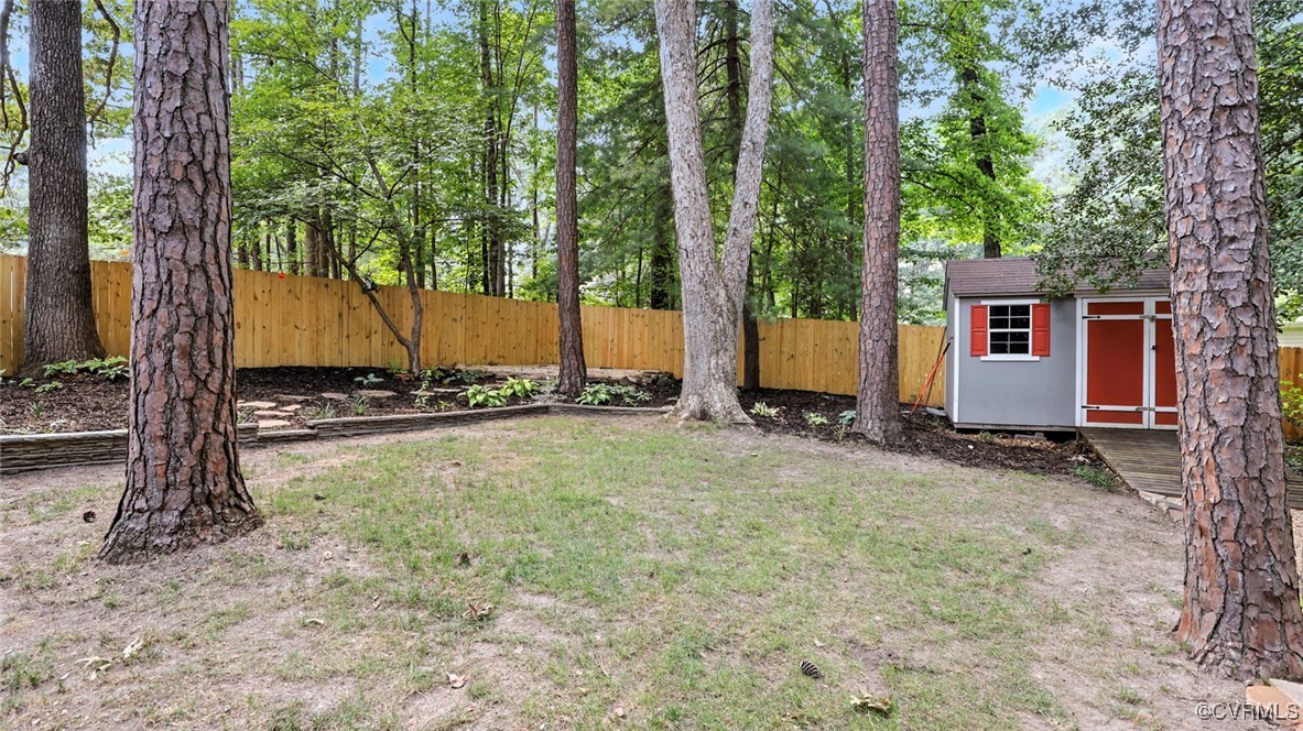 636 Spirea Road North Chesterfield, VA 23236 - Photo 47 of 47 Fenced backyard with a storage shed