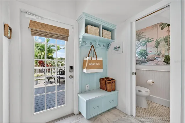 a bathroom with a sink a mirror and a toilet
