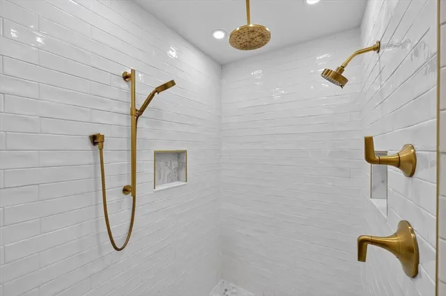 a view of a brick house with a balcony