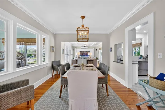 a living room with fireplace furniture and a flat screen tv