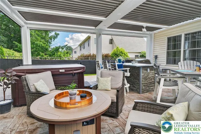 a view of a swimming pool with a patio