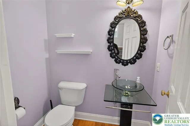 a bath tub sitting next to a window