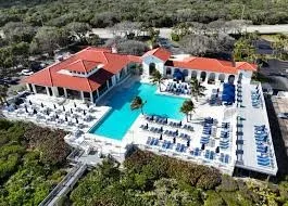 an aerial view of multiple houses with yard