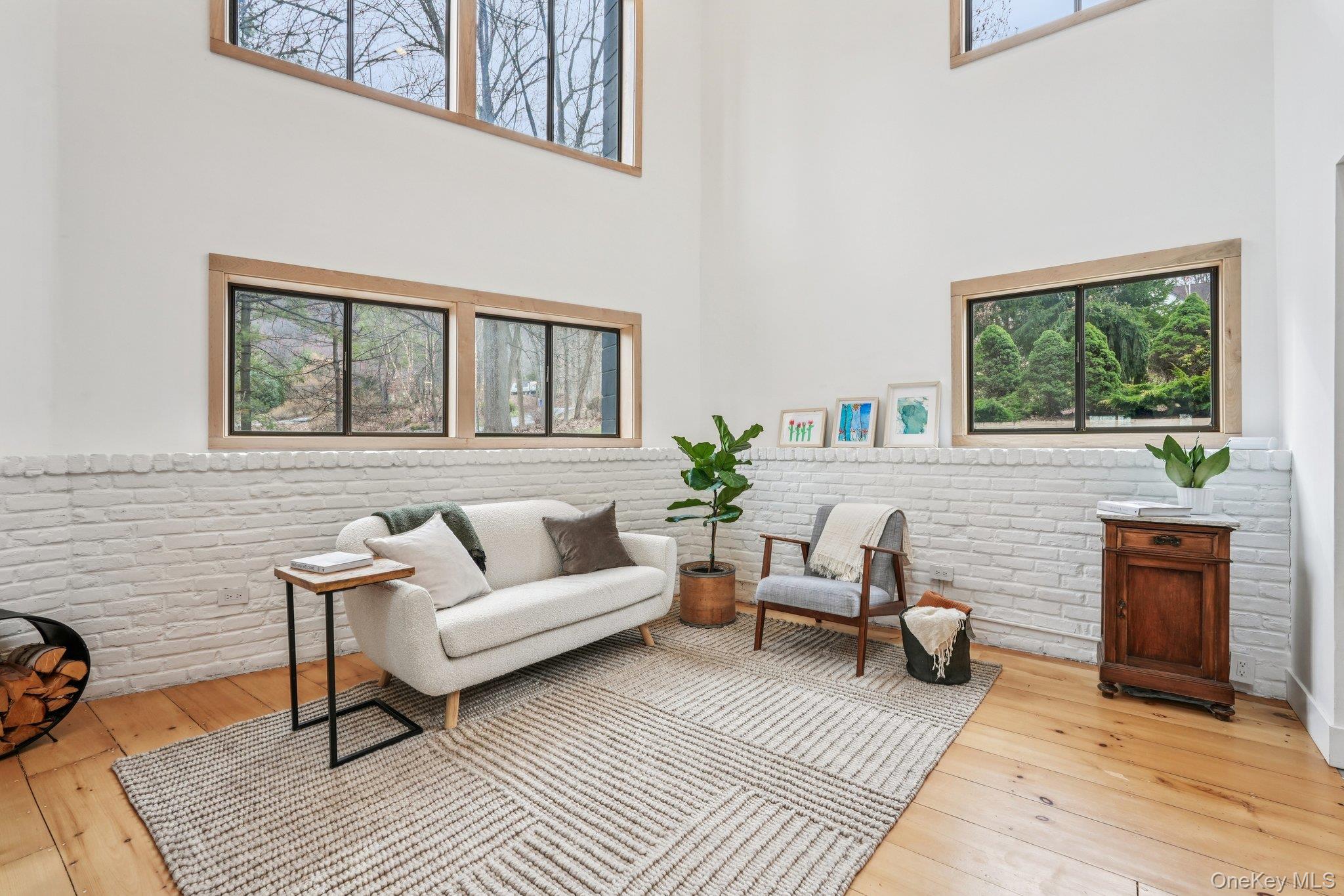 4 Mountain Brook Road Cornwall, NY 12518 - Photo 11 of 45 Living room featuring light wood-style flooring and a high ceiling