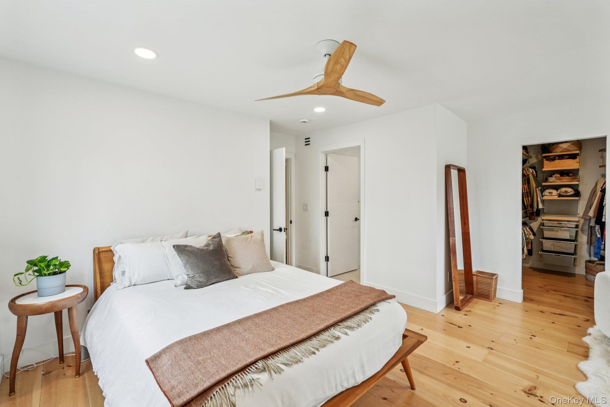 4 Mountain Brook Road Cornwall, NY 12518 - Photo 18 of 45 Bedroom featuring a spacious closet, light wood-type flooring, ceiling fan, and recessed lighting