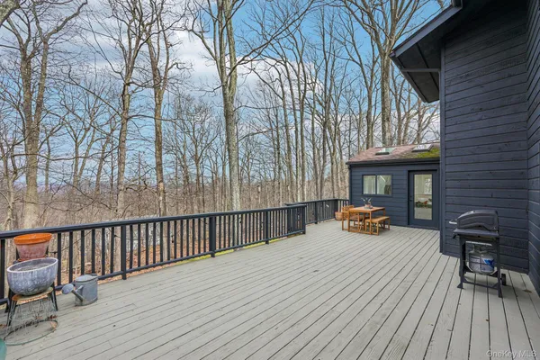 a view of a chairs on the deck