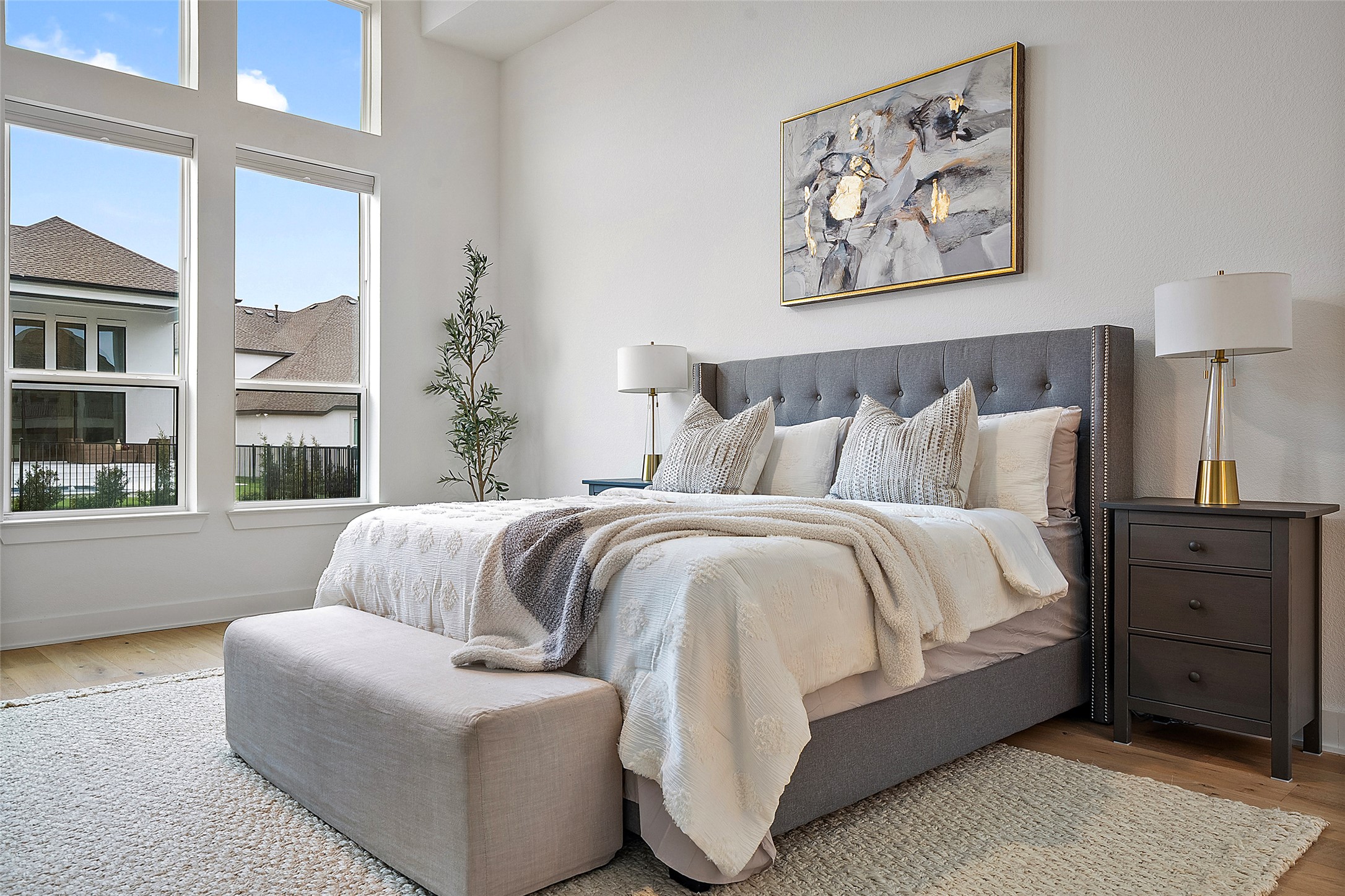 5009 Forenza Trace Leander, TX 78641 - Photo 16 of 39 a spacious bedroom with a bed and a large window