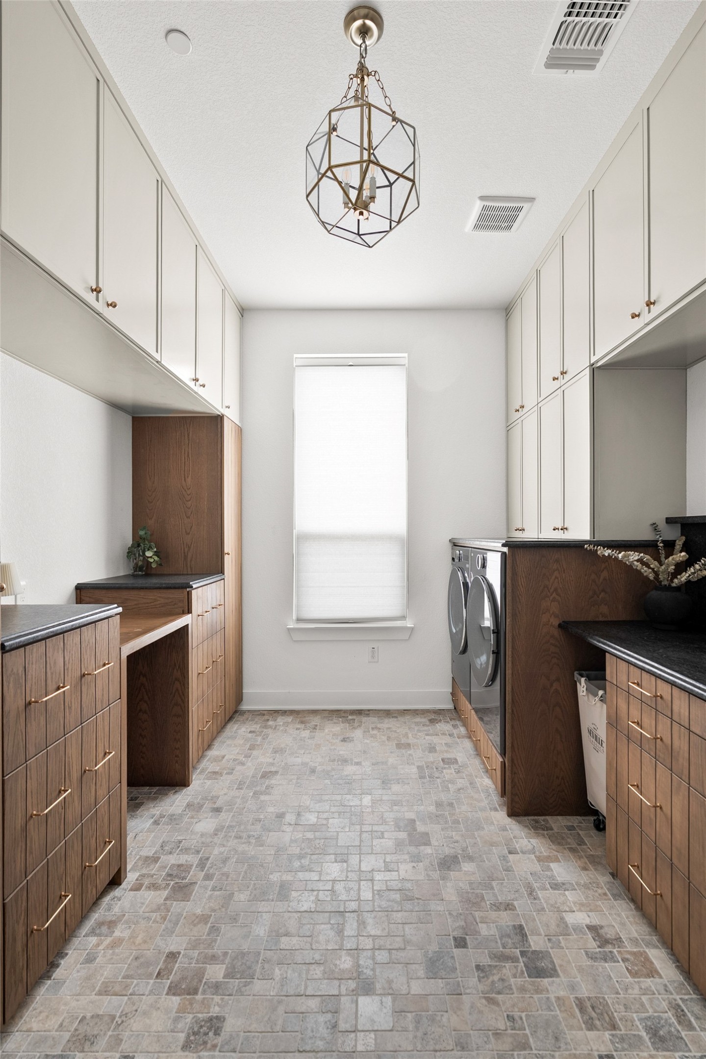 5009 Forenza Trace Leander, TX 78641 - Photo 25 of 39 a kitchen with a stove a sink and a refrigerator