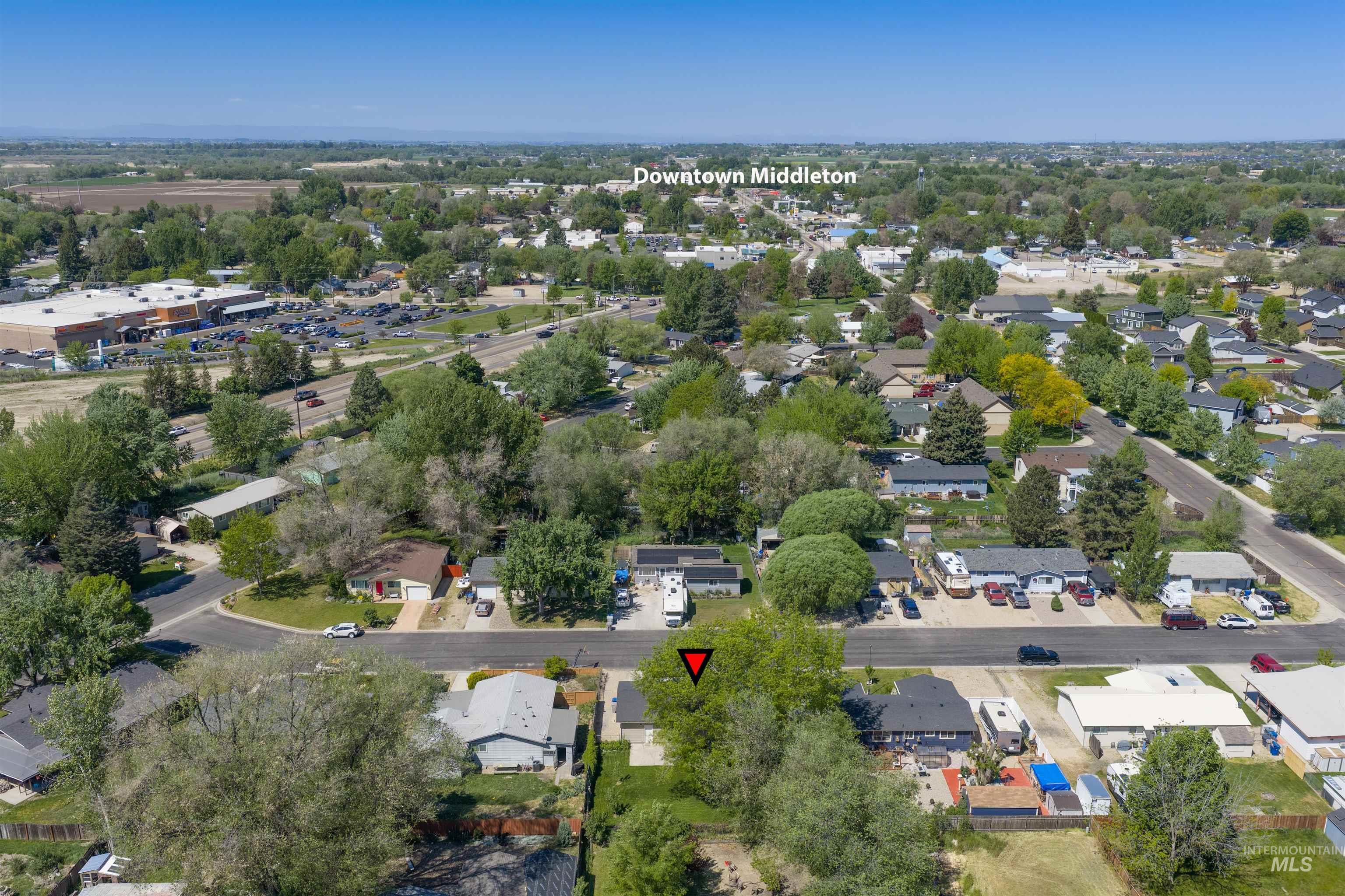 9 Villa Drive Middleton, ID 83644 - Photo 28 of 33 Aerial perspective showcasing the property and neighborhood with established trees