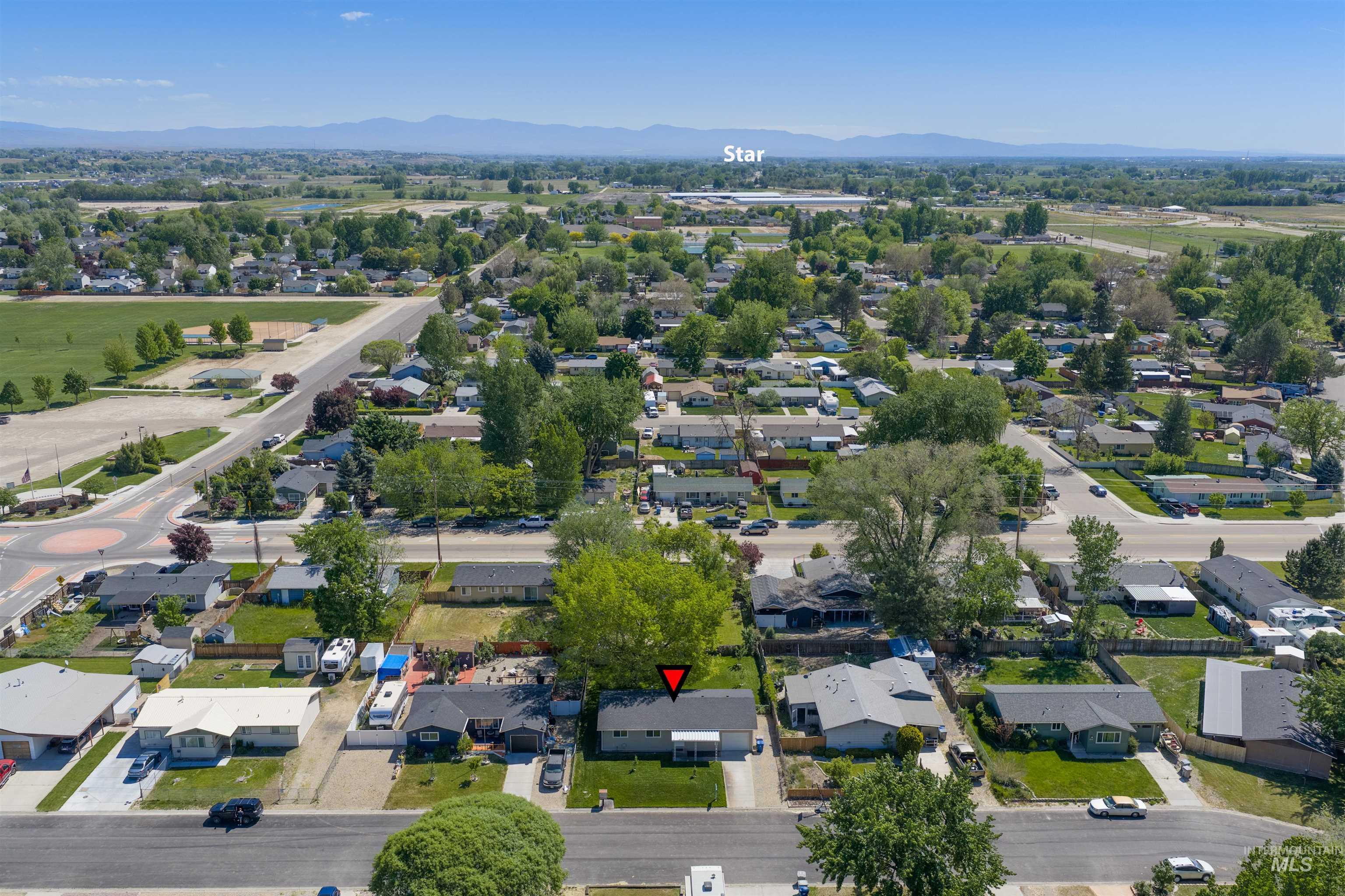 9 Villa Drive Middleton, ID 83644 - Photo 30 of 33 Aerial perspective showcasing the neighborhood with established homes and mature trees