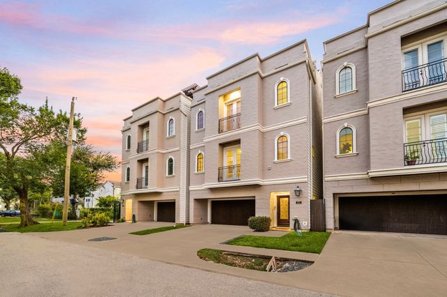 a patio with patio lots of furniture and outdoor seating