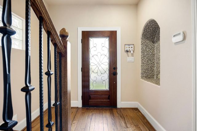 a kitchen with a stove a sink and a refrigerator