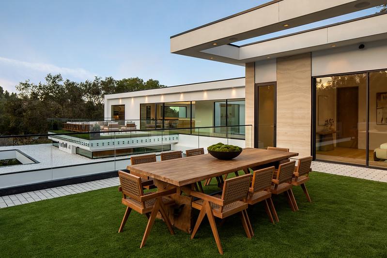 349 Walsh Road Atherton, CA 94027 - Photo 21 of 34 a view of a patio with table and chairs with wooden floor and fence