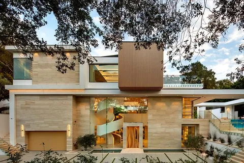 a bedroom with double bed and a window