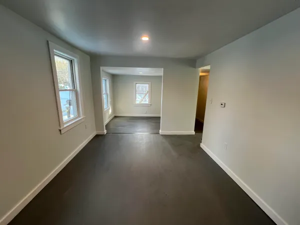 an empty room with windows