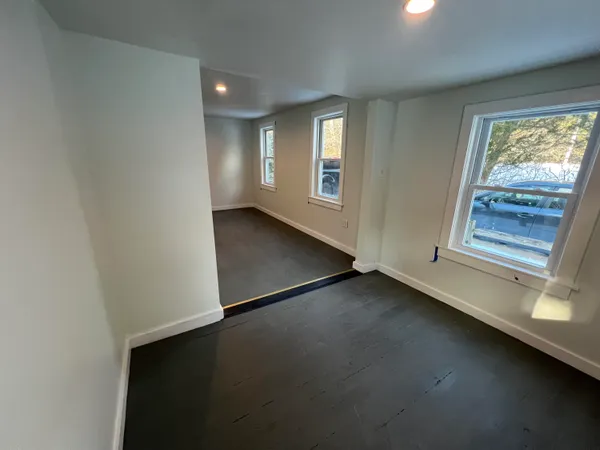 an empty room with windows