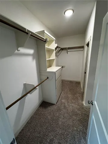 a view of a room with racks on the wall