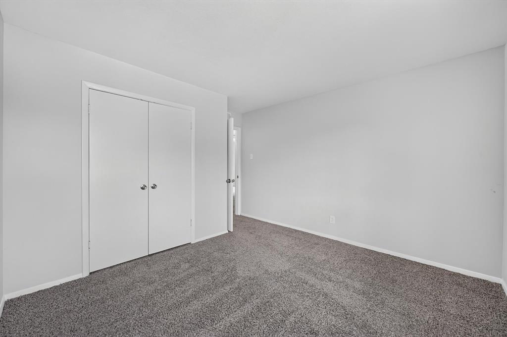 1801 East Grauwyler Road, Unit 101 Irving, TX 75061 - Photo 17 of 39 a view of an empty room