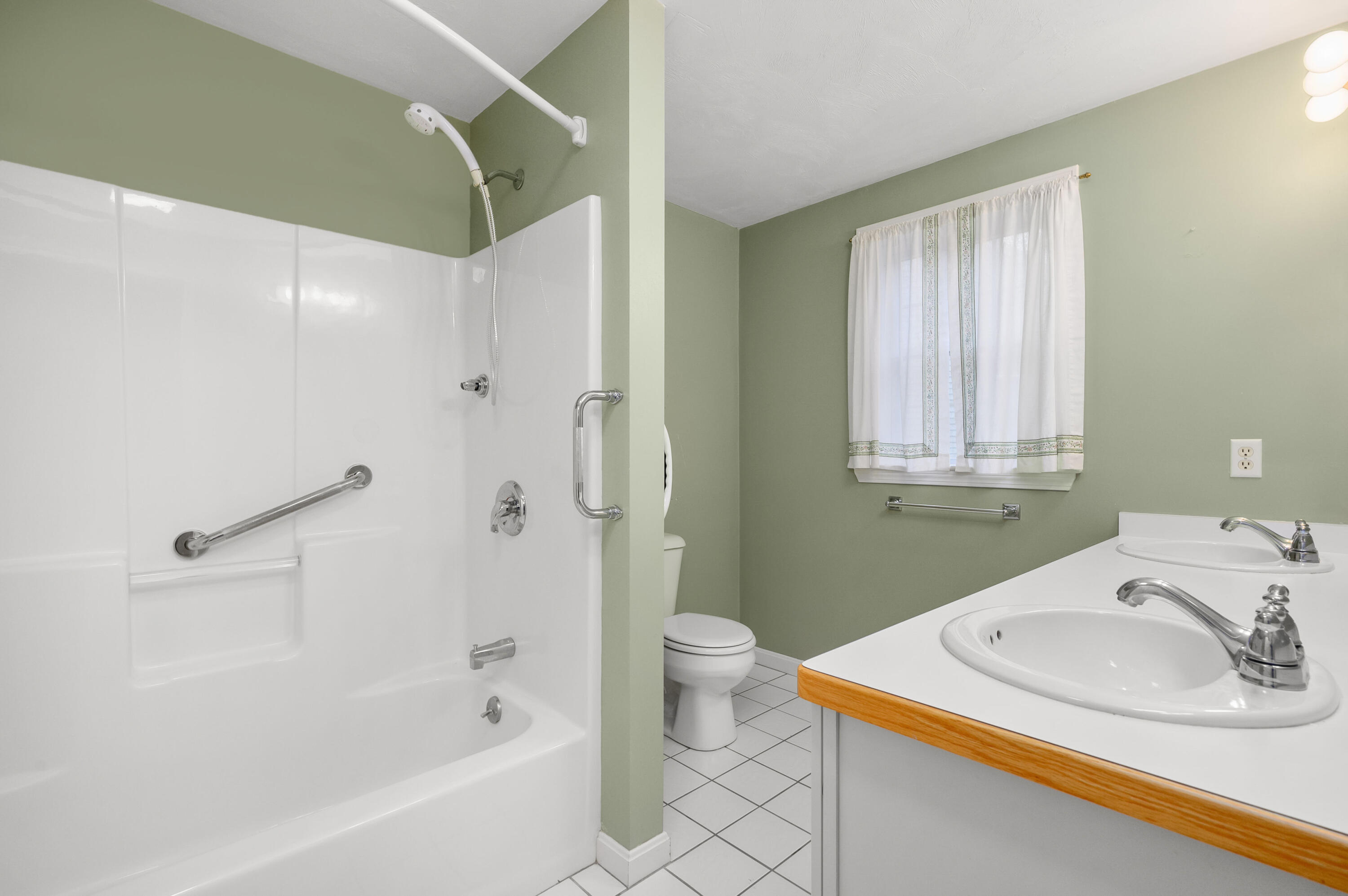 105 Snead Drive Mashpee, MA 02649 - Photo 19 of 35 a bathroom with a sink and a mirror