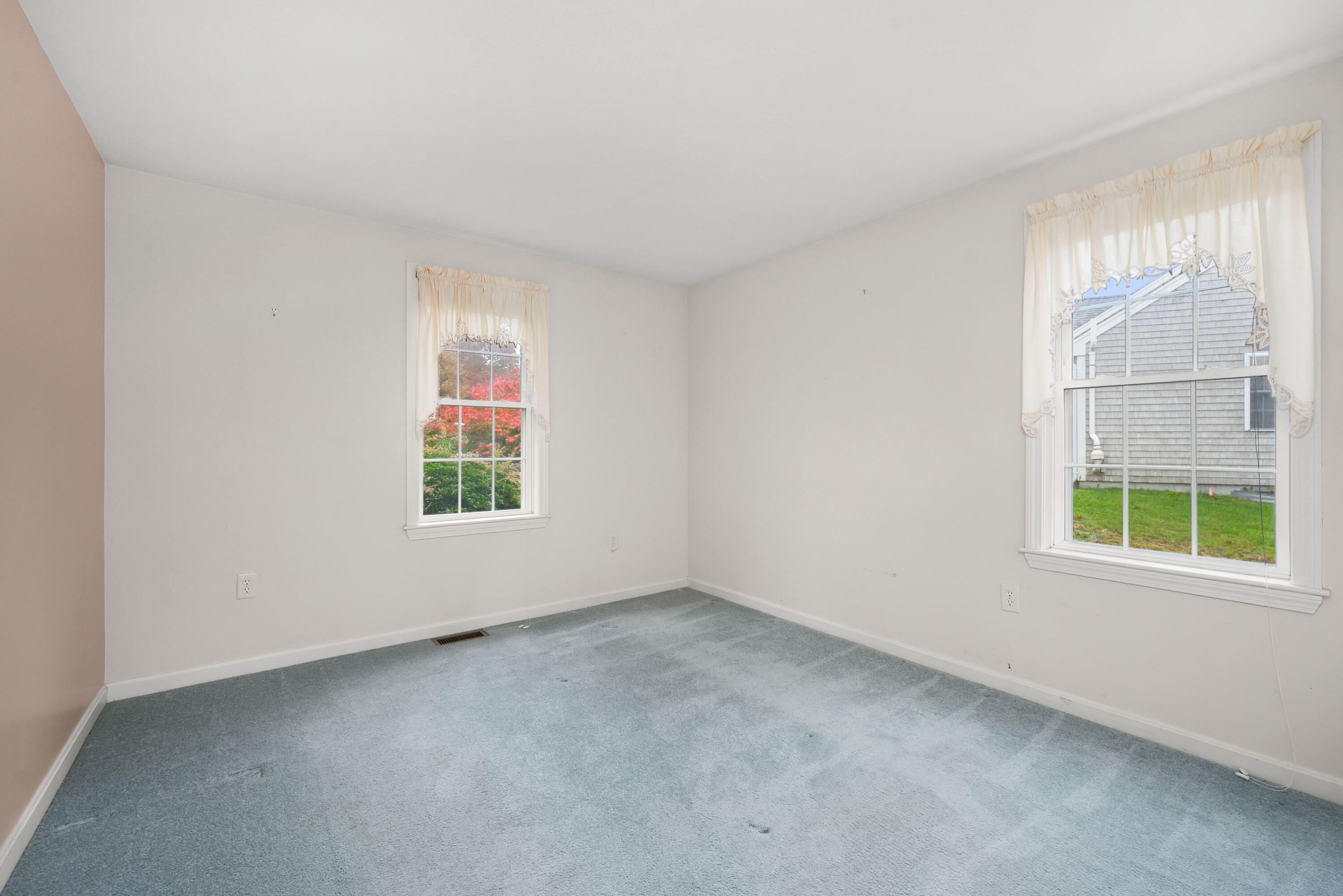 105 Snead Drive Mashpee, MA 02649 - Photo 23 of 35 an empty room with a window