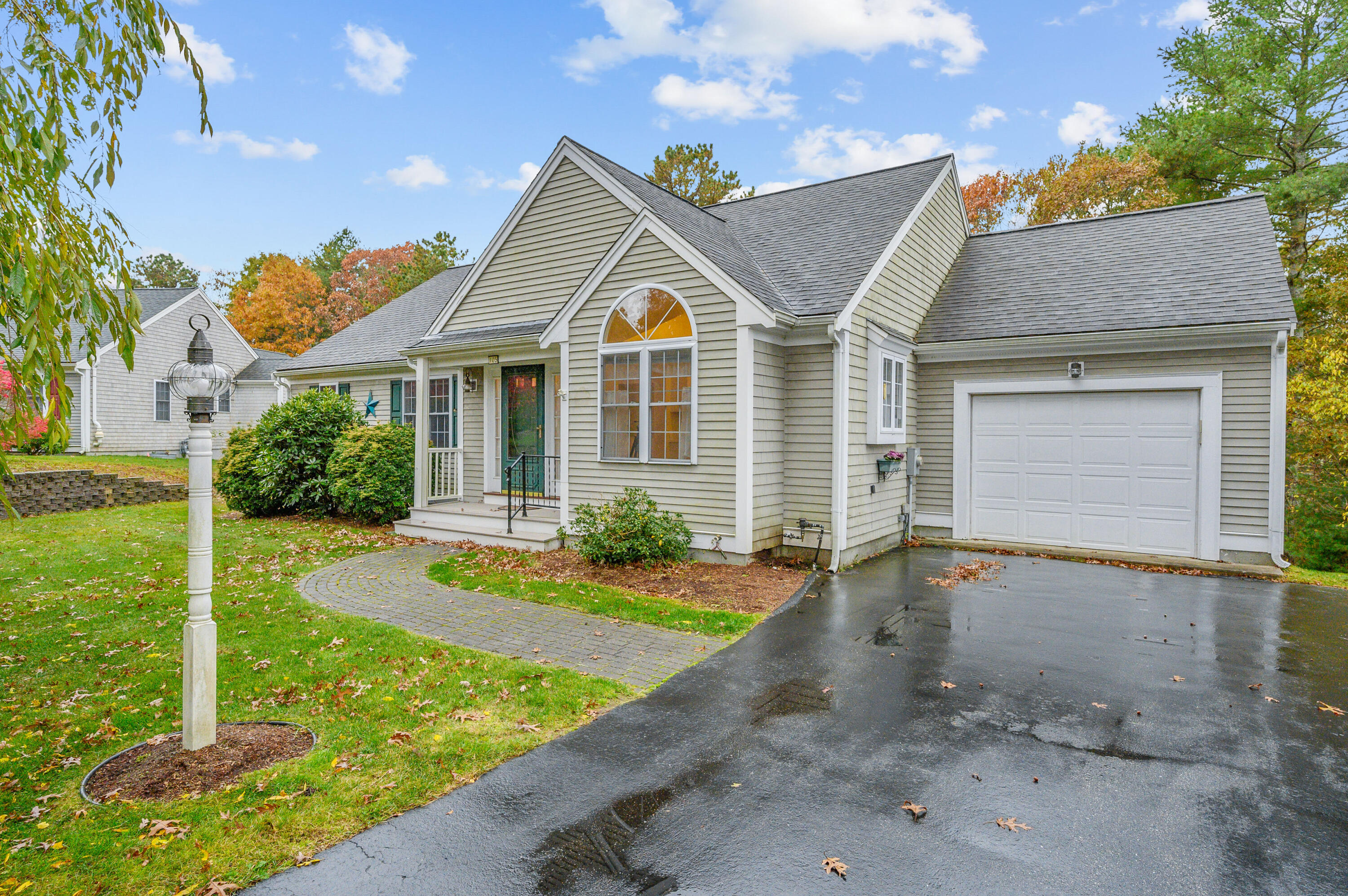 105 Snead Drive Mashpee, MA 02649 - Photo 3 of 35 a view of a yard in front of house