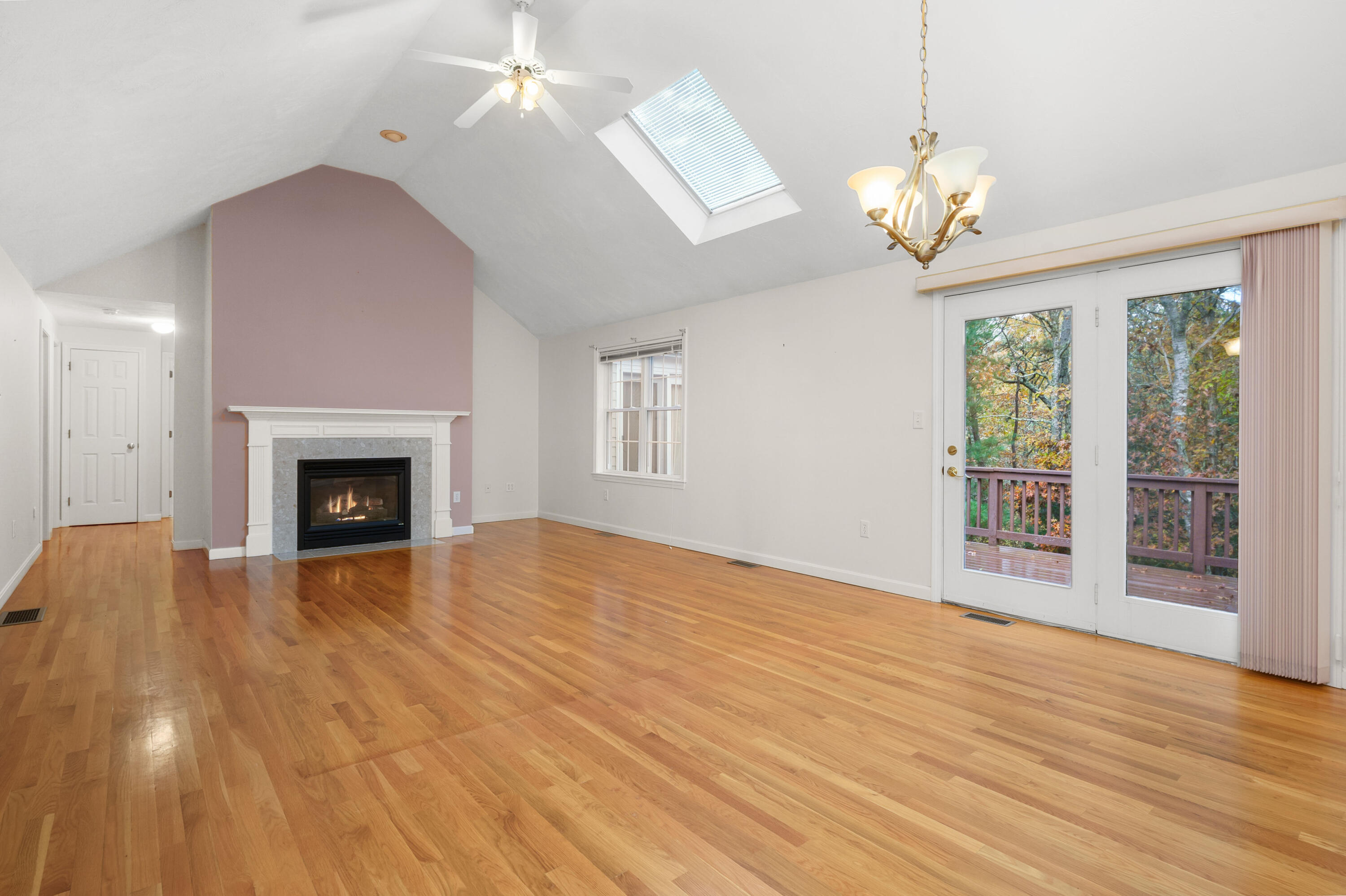 105 Snead Drive Mashpee, MA 02649 - Photo 8 of 35 a view of an empty room with wooden floor and a window