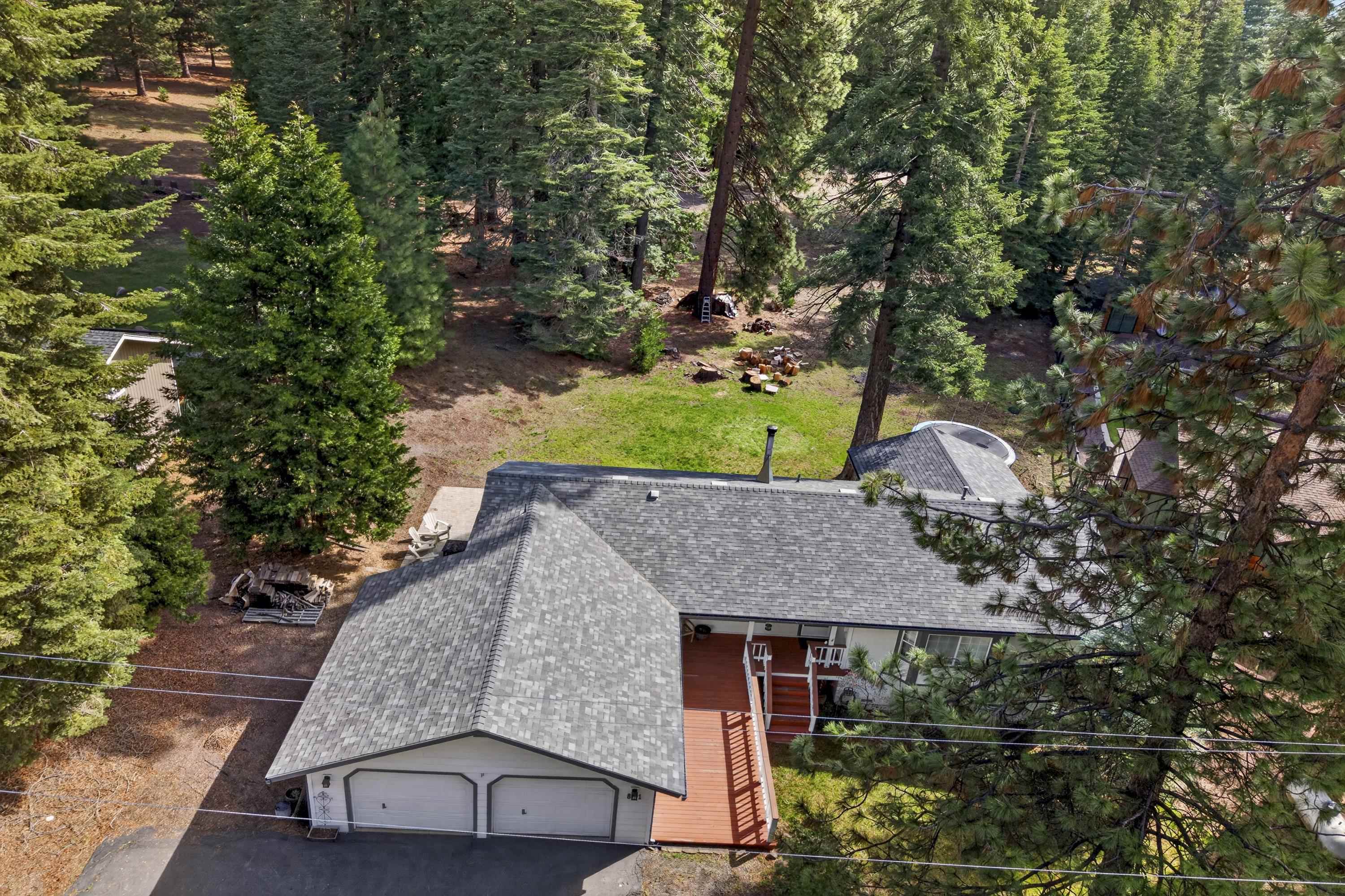 811 Golf Club Road Lake Almanor, CA 96137 - Photo 37 of 42 an aerial view of a house with a yard basket ball court and outdoor seating