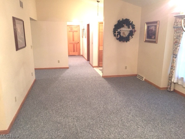 420 Ansel Road Geneva, OH 44041 - Photo 6 of 22 Living Room and Dining Room with New Carpet