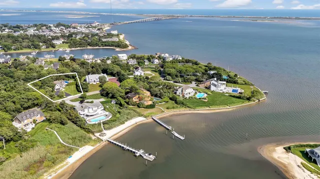 a view of a swimming pool with a yard